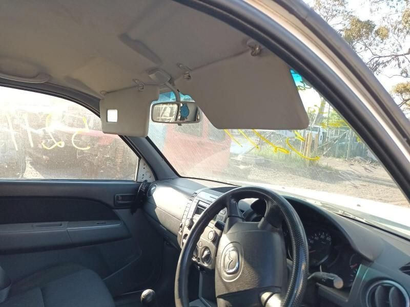 The Inside of a Car With the Door Open and a Steering Wheel — South West 4WD Wreckers In Harristown, QLD