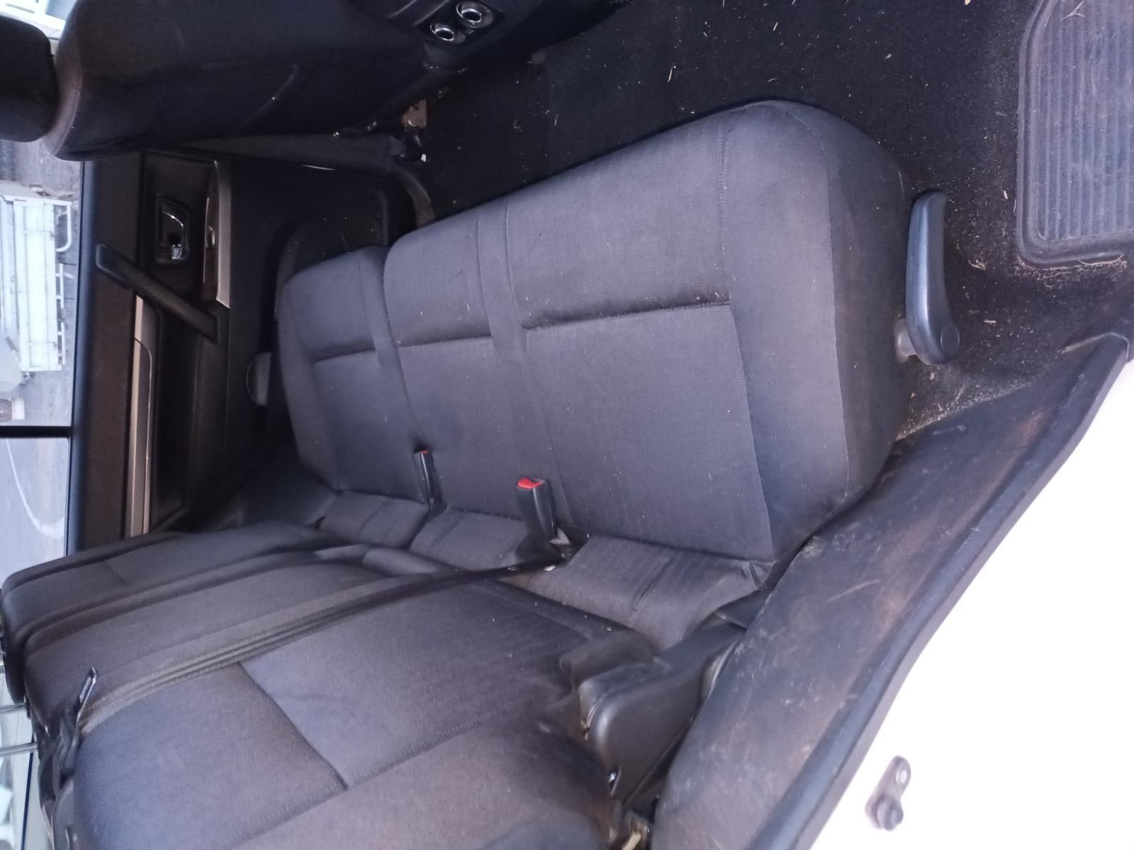 The Back Seat of a White Car Has a Seat Belt on It — South West 4WD Wreckers In Brisbane, QLD