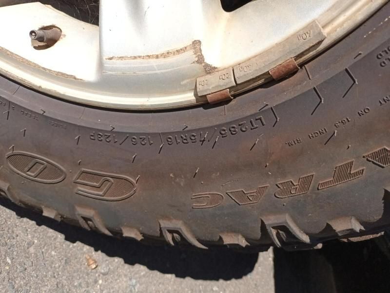 A Close Up of a Tire That Says Lt255 on It — South West 4WD Wreckers In Harristown, QLD
