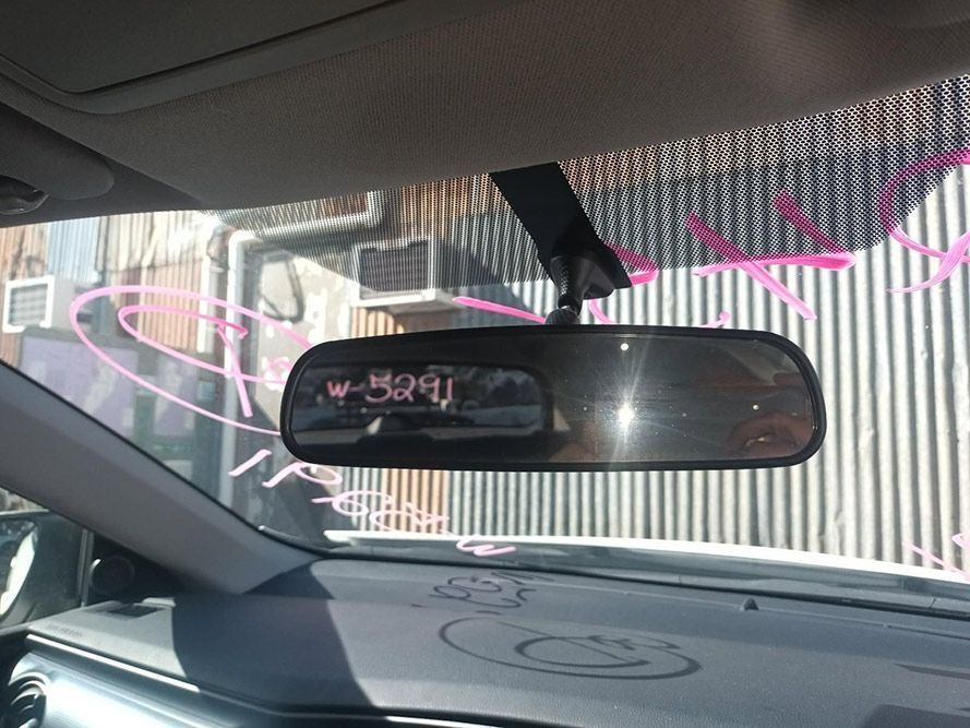 The Rear View Mirror of a Car — South West 4WD Wreckers in Harristown, QLD