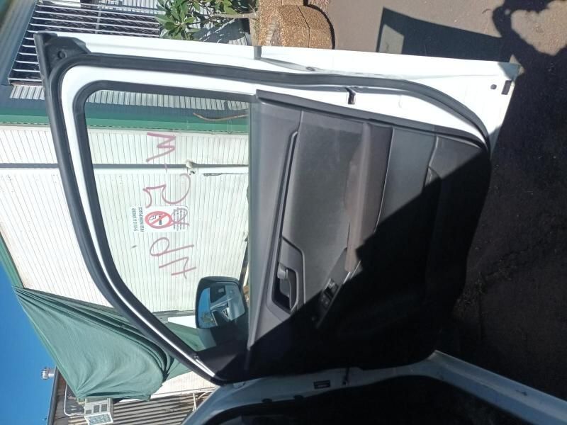 A White Car is Parked in Front of a Sign That Says Mr. Body — South West 4WD Wreckers In Harristown, QLD