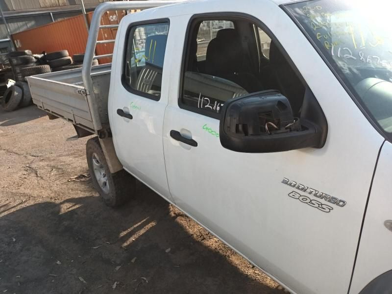 A White Pickup Truck is Parked in a Parking Lot — South West 4WD Wreckers In Harristown, QLD