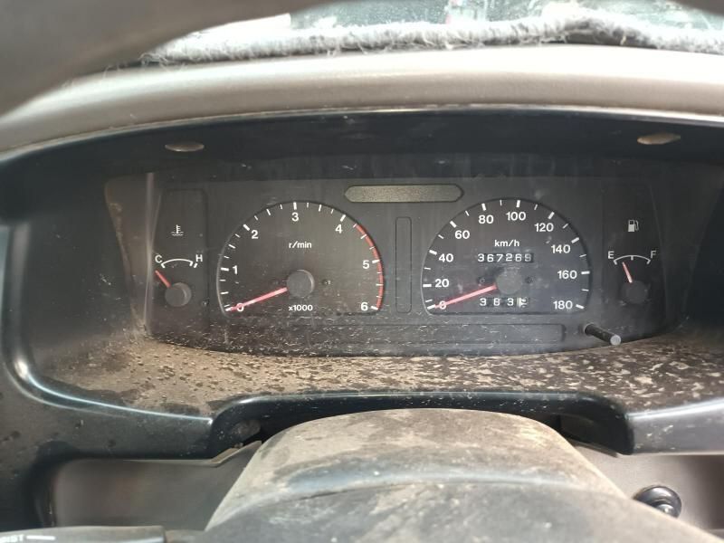 A Dirty Dashboard of a Car With a Tachometer That Says ' Rpm ' on It — South West 4WD Wreckers In Harristown, QLD