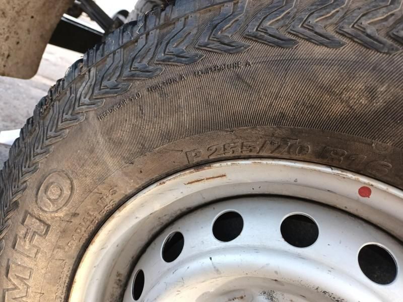 A Close Up of a Tire on a White Rim — South West 4WD Wreckers In Brisbane, QLD