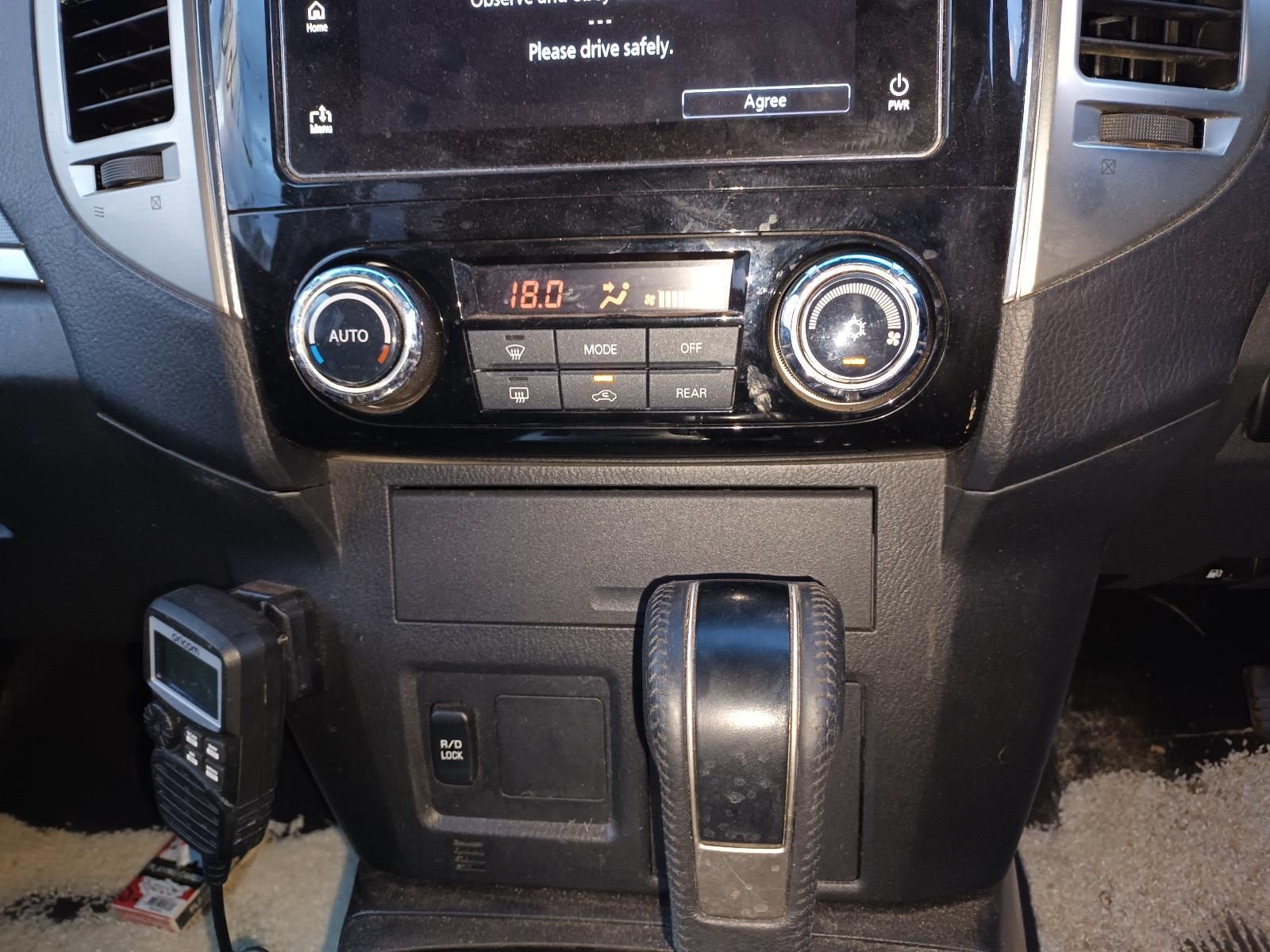 A Close Up of a Car Dashboard With a Radio and Climate Control — South West 4WD Wreckers In Brisbane, QLD
