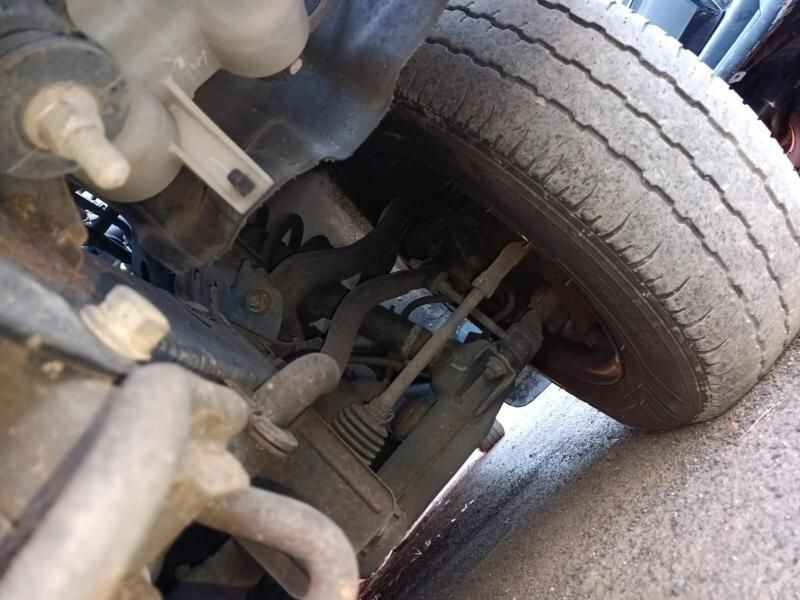 A Close Up of the Underside of a Car 's Tire — South West 4WD Wreckers In Harristown, QLD