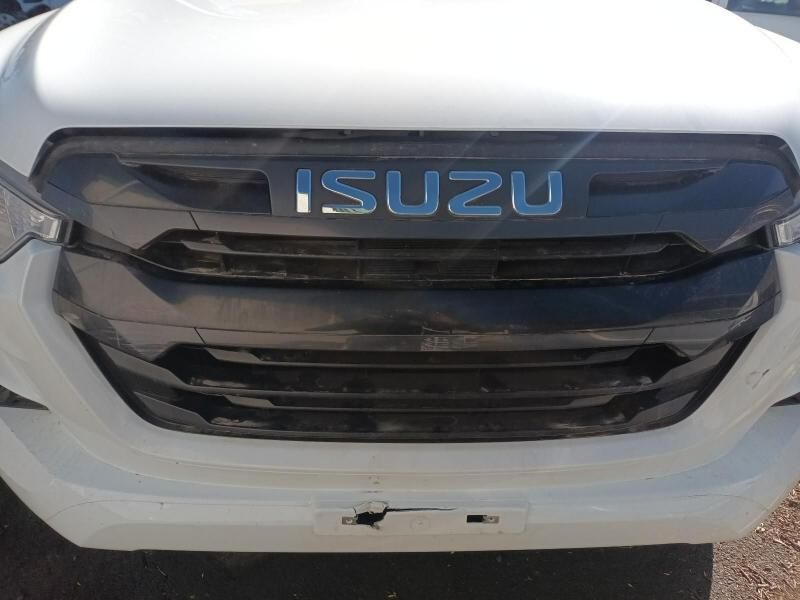 A White Isuzu Truck is Parked on the Side of the Road — South West 4WD Wreckers In Harristown, QLD