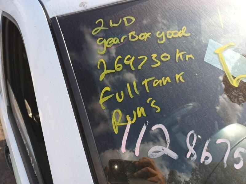 A 2nd Gear Box is Written on the Windshield of a Car — South West 4WD Wreckers In Harristown, QLD