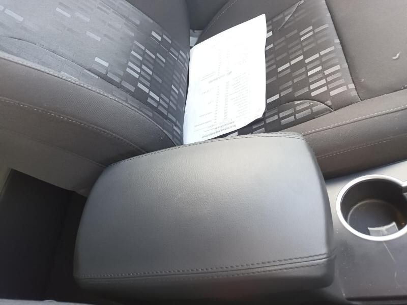 A Car Arm Rest With a Cup Holder Underneath It — South West 4WD Wreckers In Brisbane, QLD