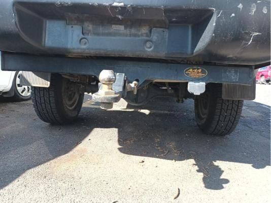 The Back End of a Truck With a Trailer Hitch Attached to It — South West 4WD Wreckers In Harristown, QLD