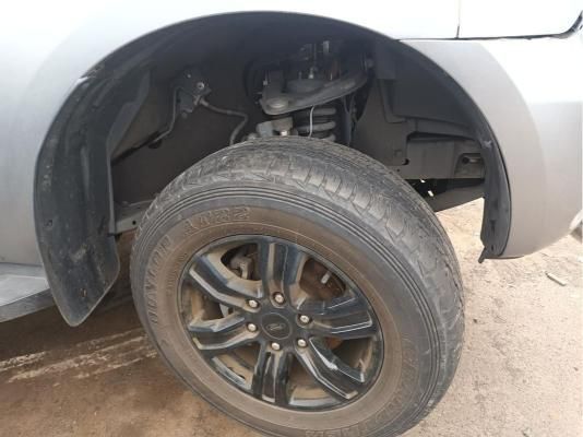 A Close Up of a Car Wheel on a Dirt Road — South West 4WD Wreckers In Harristown, QLD