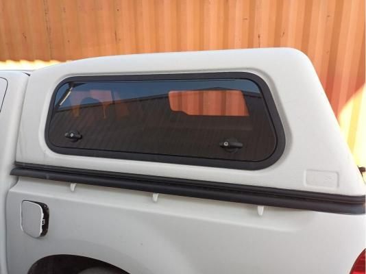A White Truck With a Canopy on Top of It — South West 4WD Wreckers In Harristown, QLD