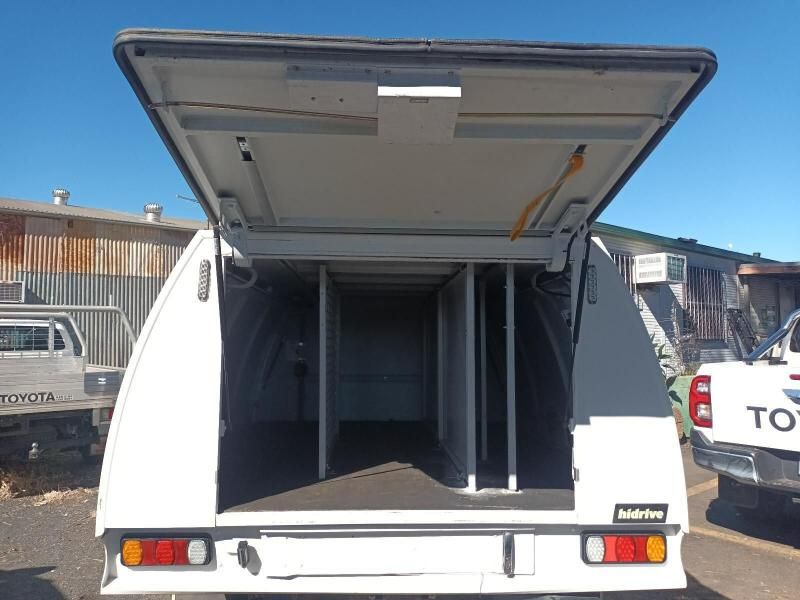 A Toyota Truck is Parked Next to a White Canopy — South West 4WD Wreckers In Harristown, QLD