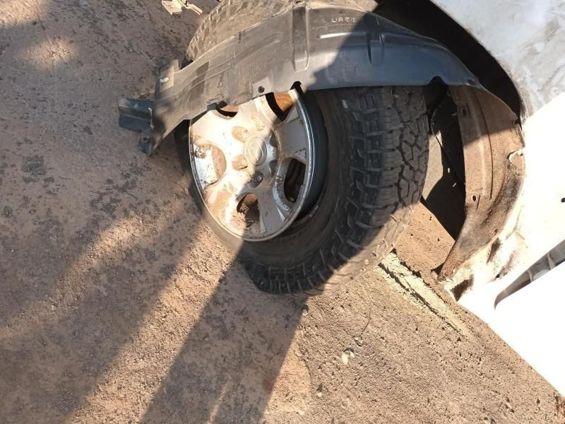 A Close Up of a Car Wheel on a Dirt Road — South West 4WD Wreckers In Harristown, QLD