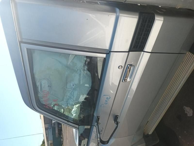 A Silver Truck With a Broken Windshield is Parked on the Side of the Road — South West 4WD Wreckers In Harristown, QLD