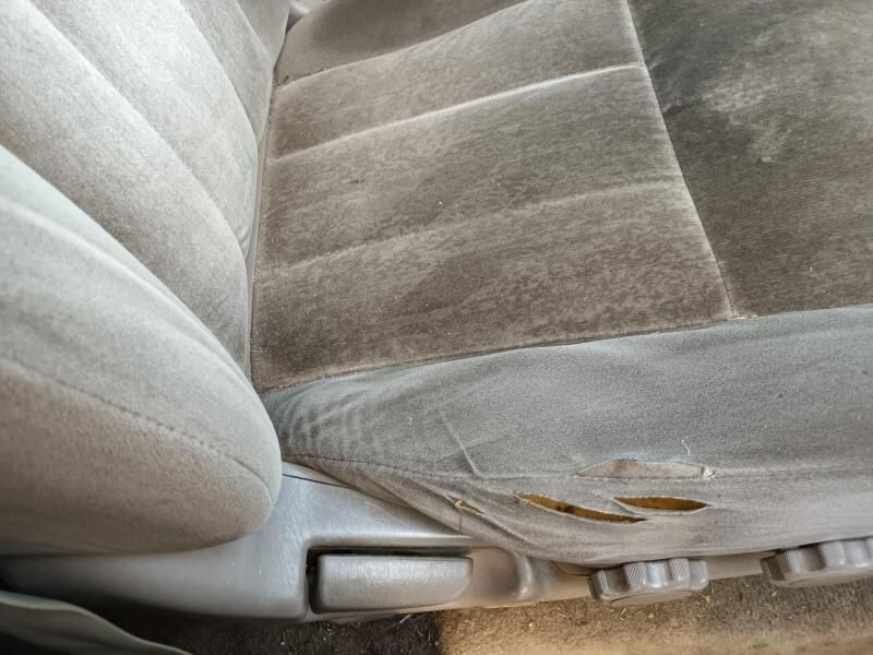 A Close Up of a Car Seat With a Hole in It — South West 4WD Wreckers In Harristown, QLD