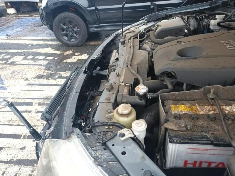 A Car With the Hood Open and a Hita Battery — South West 4WD Wreckers In Brisbane, QLD