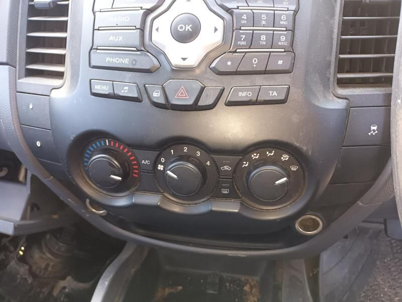 A Close Up of a Car Dashboard With Buttons and a Radio — South West 4WD Wreckers In Brisbane, QLD