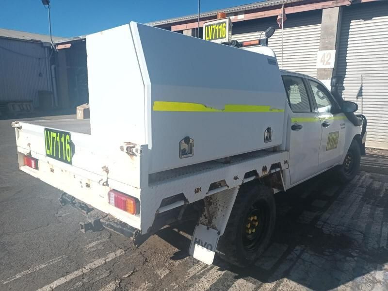 A White Truck With the License Plate Jt116 is Parked in a Parking Lot — South West 4WD Wreckers In Brisbane, QLD