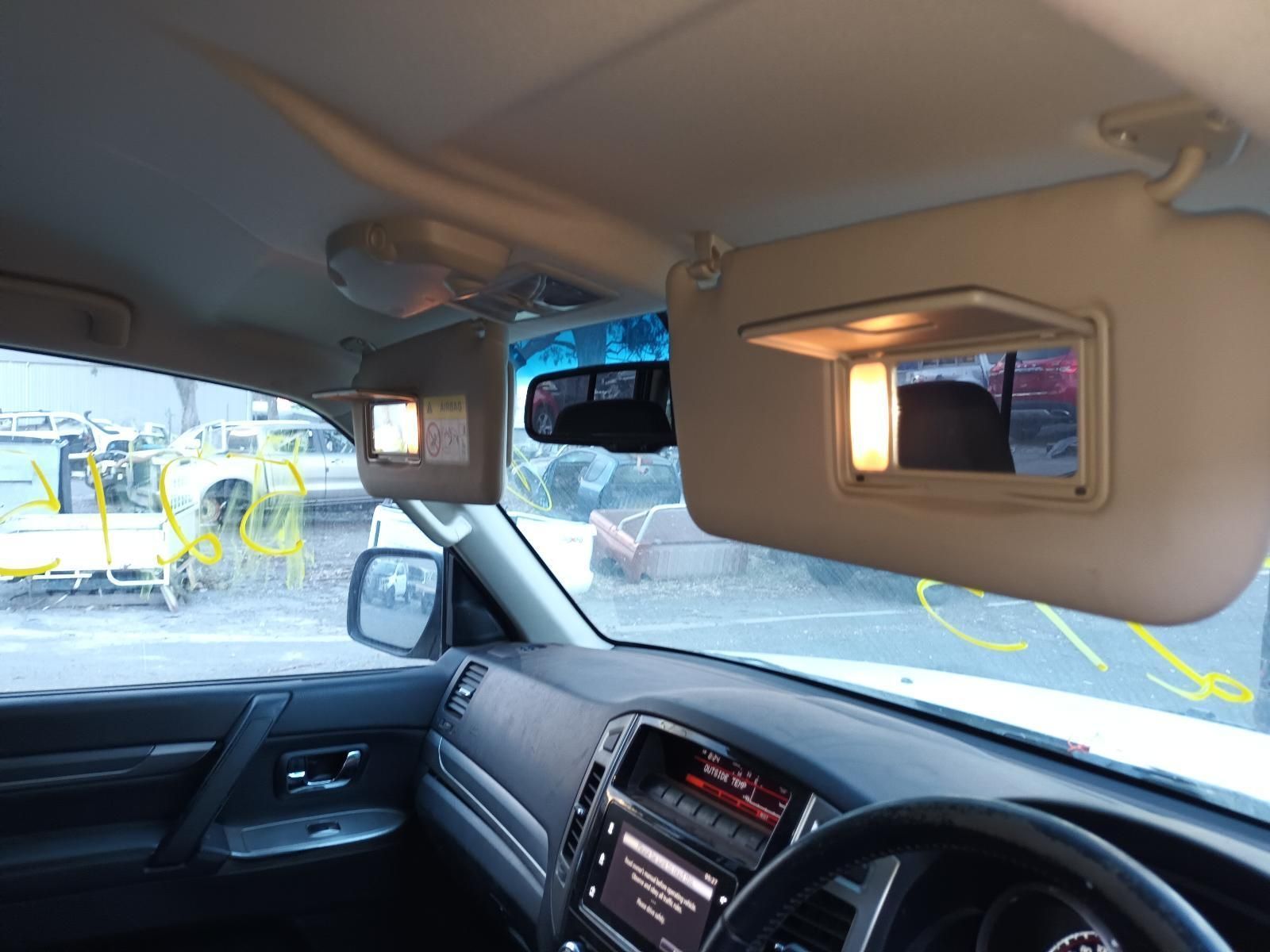 The Inside of a Car With Sun Visors and a Steering Wheel — South West 4WD Wreckers In Brisbane, QLD