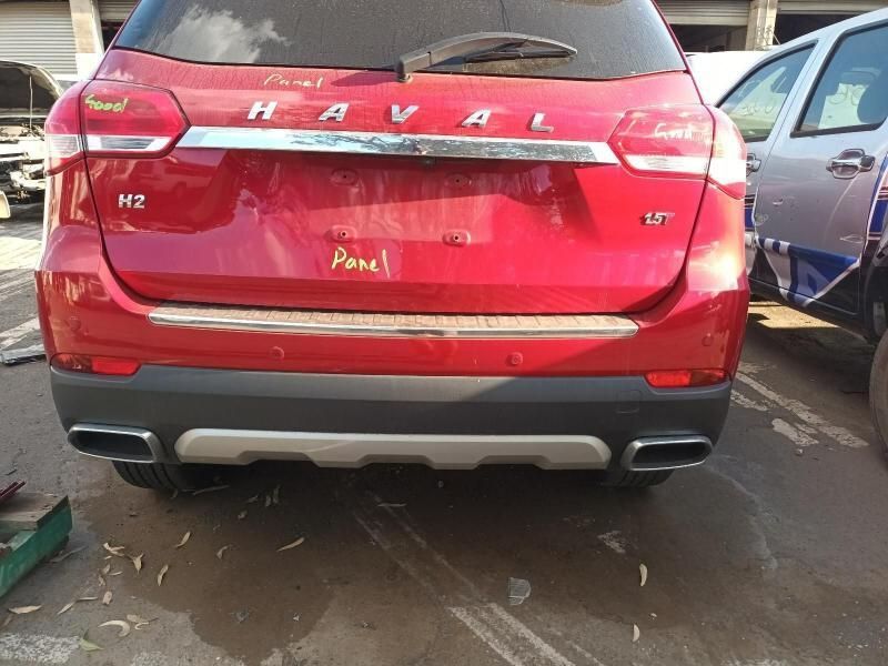 A Red Haval Car is Parked in a Parking Lot — South West 4WD Wreckers In Brisbane, QLD