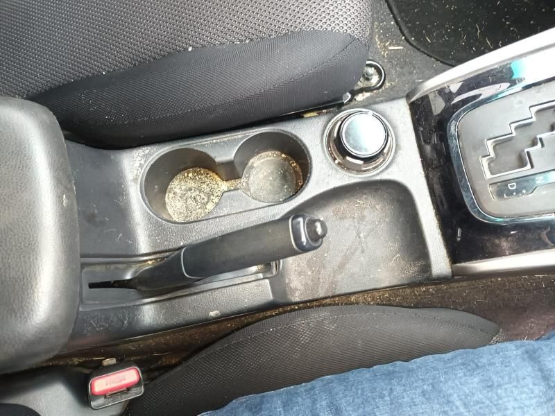 A Person is Sitting in the Driver 's Seat of a Car — South West 4WD Wreckers In Brisbane, QLD