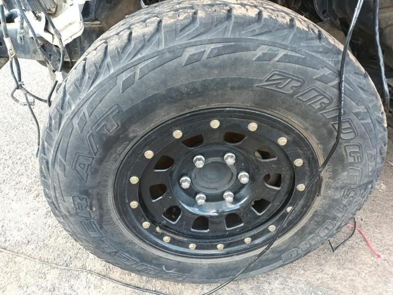A Close Up of a Tire on a Car With a Black Rim — South West 4WD Wreckers In Brisbane, QLD