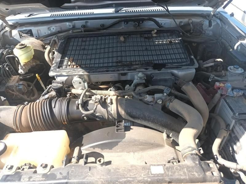 A Close Up of a Car Engine With the Hood Open — South West 4WD Wreckers In Harristown, QLD