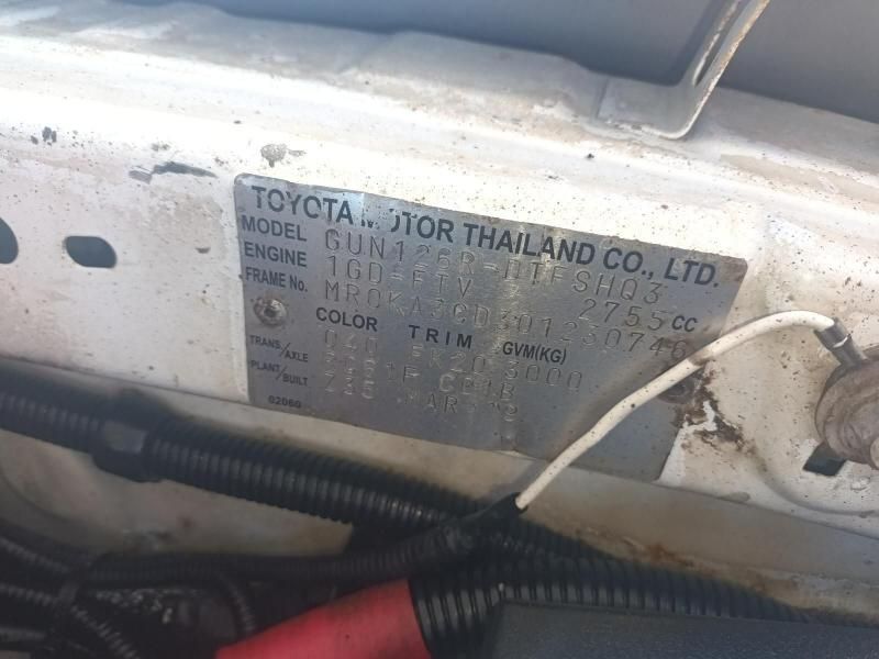 A White Toyota Car With a License Plate That Says Toyota Motor Thailand Co. Ltd — South West 4WD Wreckers In Brisbane, QLD