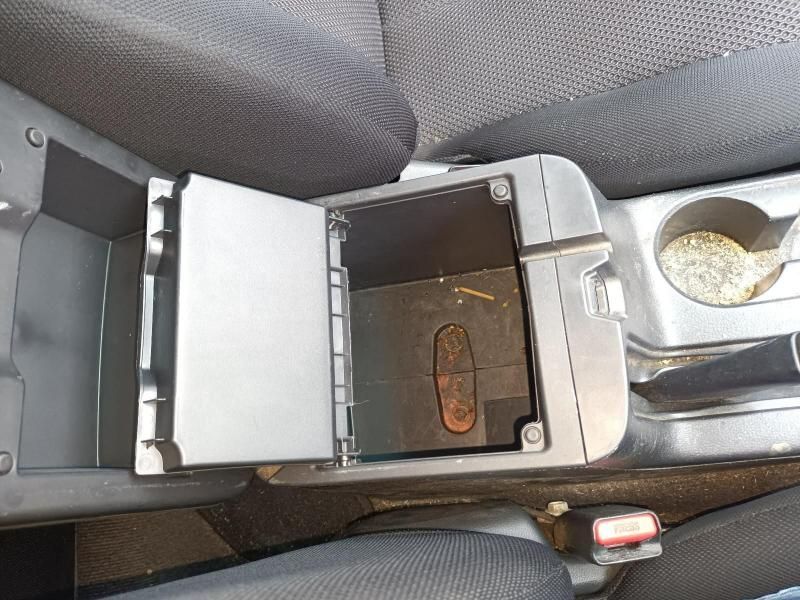 A Car Console With the Lid Open and a Cup Holder — South West 4WD Wreckers In Brisbane, QLD