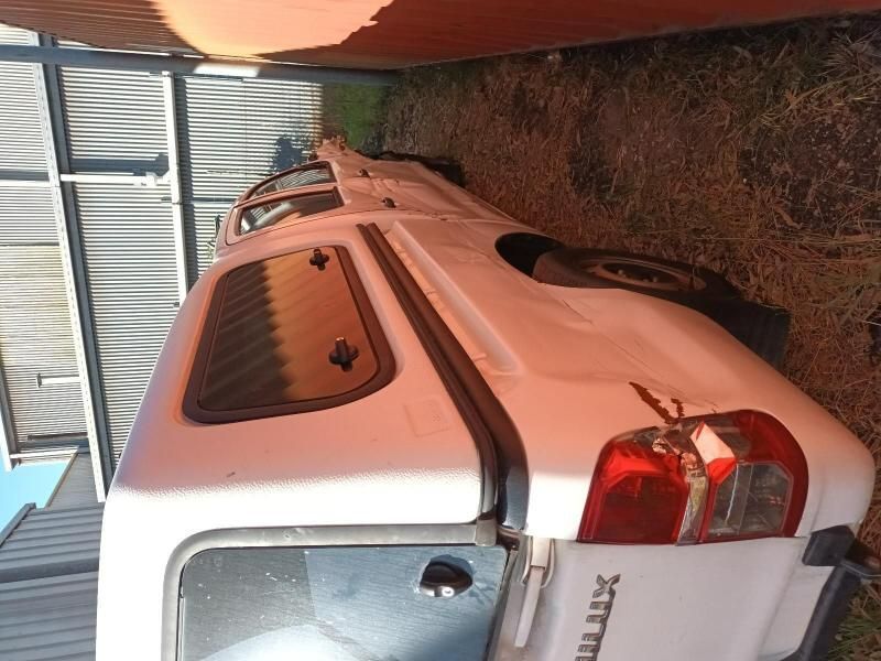 A White Truck With a Canopy on Top of It — South West 4WD Wreckers In Harristown, QLD