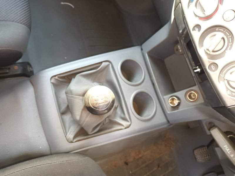 A Close Up of a Car Console With a Shifter and a Cup Holder — South West 4WD Wreckers In Harristown, QLD