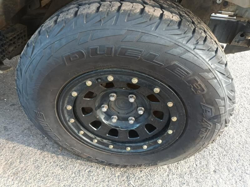 A Close Up of a Tire That Says Dueler on It — South West 4WD Wreckers In Brisbane, QLD