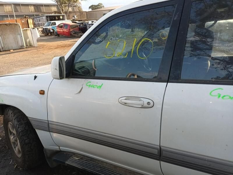 A White Car With a Green Sticker on the Door That Says Good — South West 4WD Wreckers In Harristown, QLD