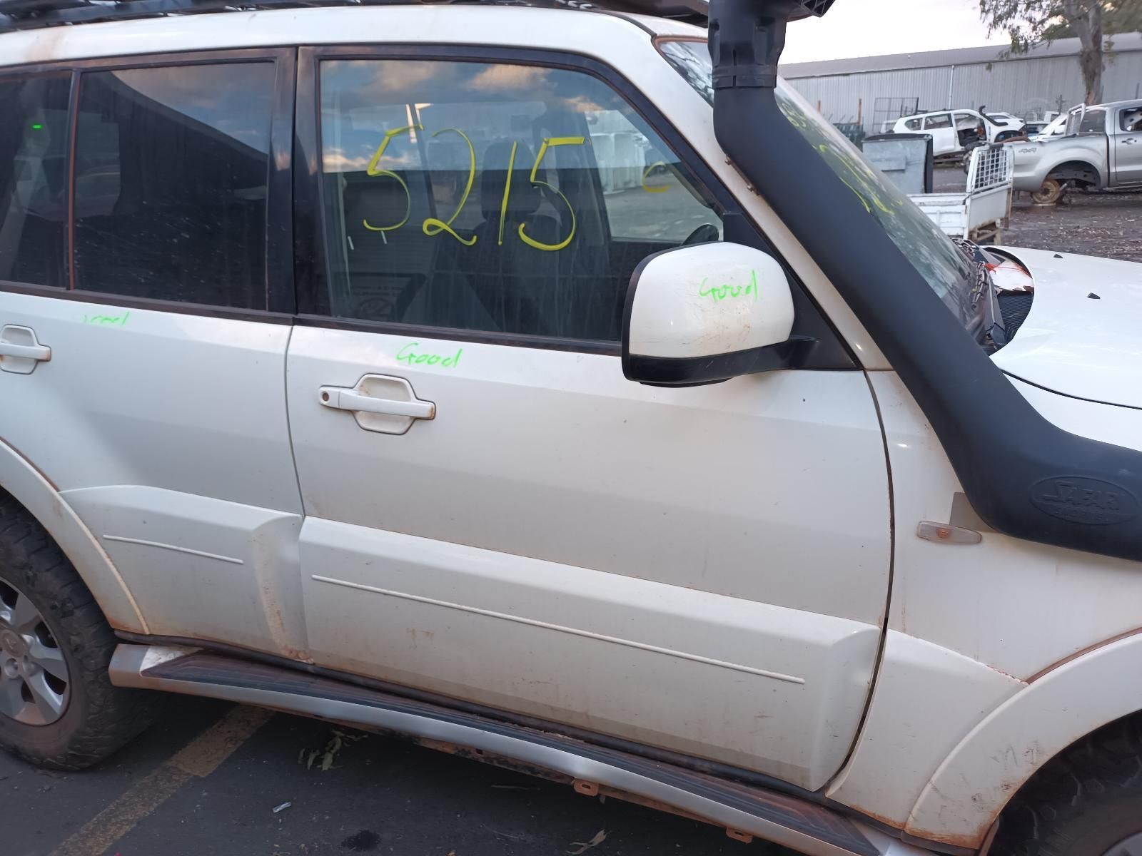 A White Suv With a Snorkel is Parked in a Parking Lot — South West 4WD Wreckers In Brisbane, QLD