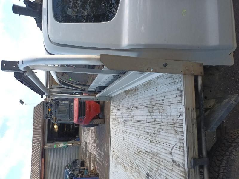 A Forklift is Sitting on the Back of a Truck — South West 4WD Wreckers In Brisbane, QLD