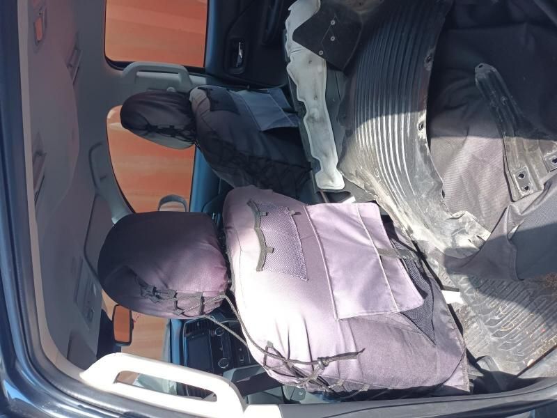 The Back Seat of a Car With a Purple Seat Cover — South West 4WD Wreckers In Harristown, QLD