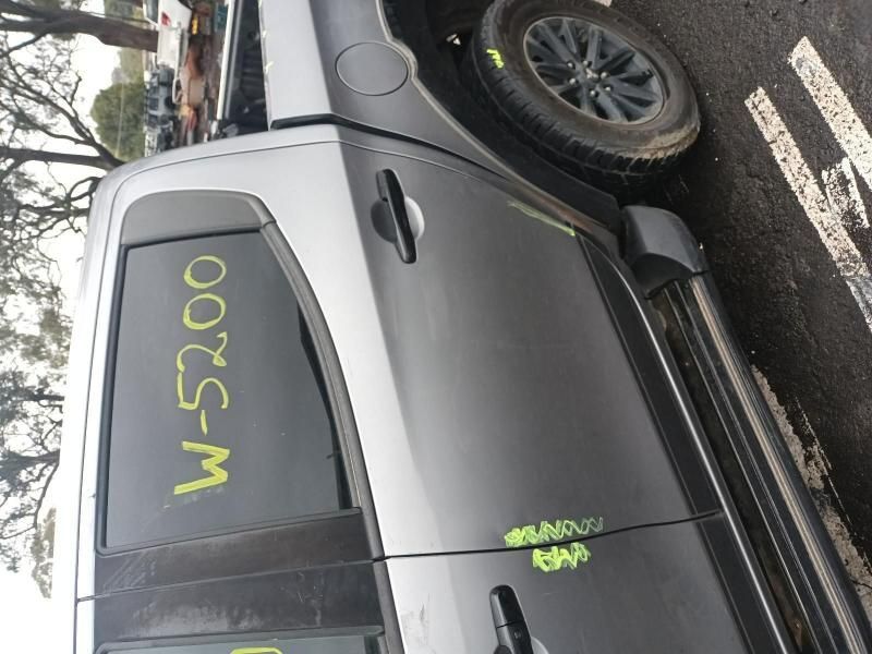 A Gray Truck With W5200 Written on the Back Window — South West 4WD Wreckers In Brisbane, QLD