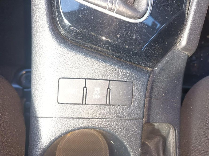 A Close Up of a Car's Center Console with a Shifter and s — South West 4WD Wreckers in Harristown, QLD