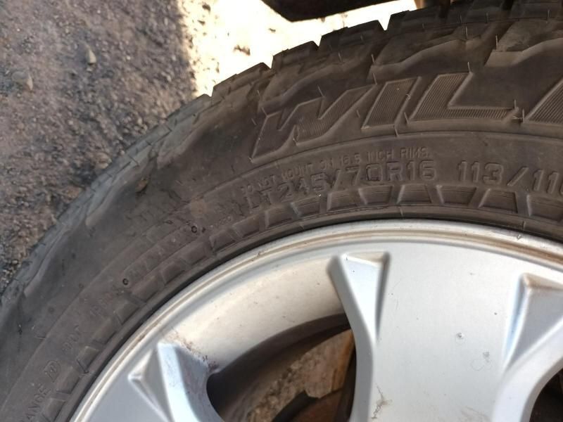 A Close Up of a Tire That Says Wild on It — South West 4WD Wreckers In Harristown, QLD