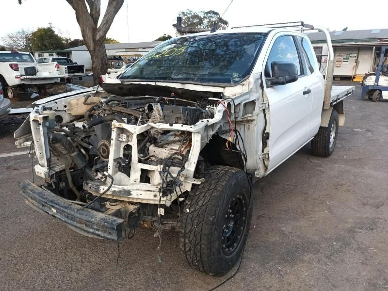 A White Truck With the Hood Removed is Parked in a Parking Lot — South West 4WD Wreckers In Brisbane, QLD
