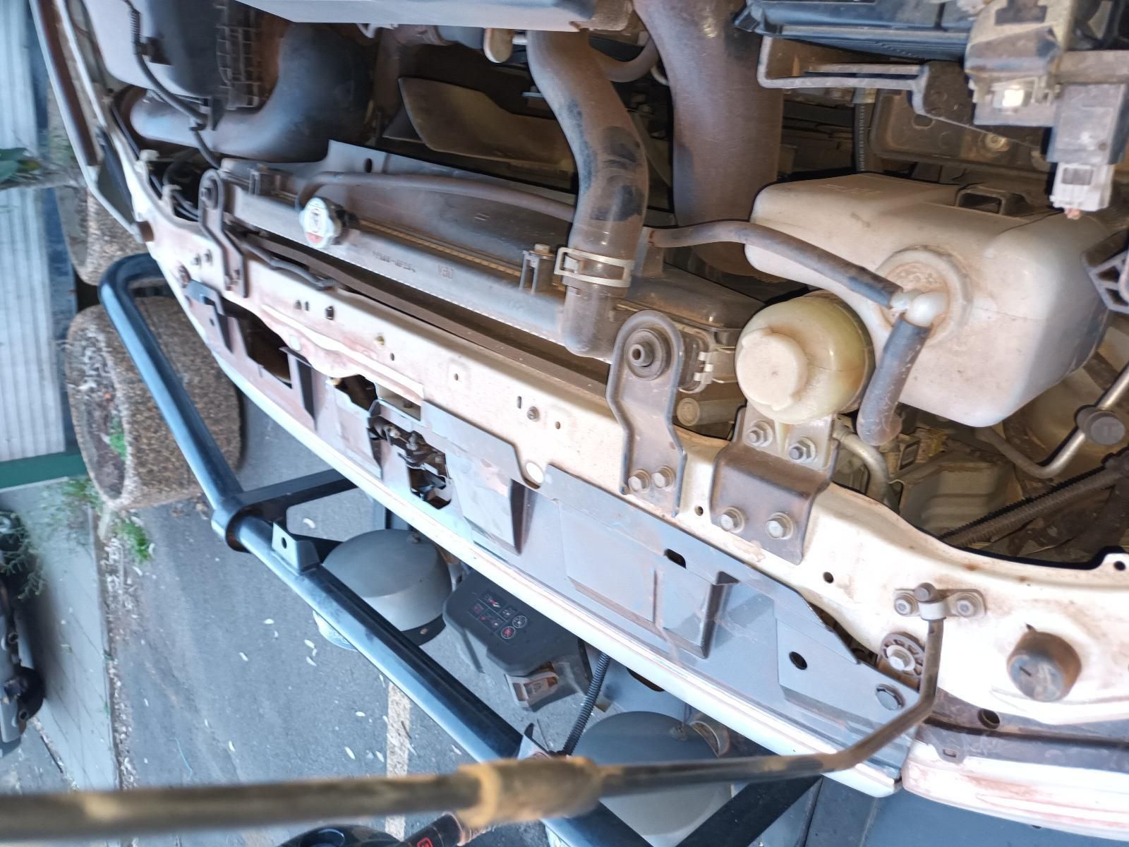 A Close Up of the Underside of a Car With the Radiator Removed — South West 4WD Wreckers In Brisbane, QLD