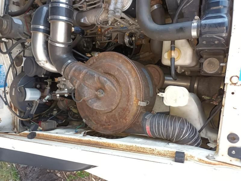 A Close Up of the Engine of a White Vehicle — South West 4WD Wreckers In Brisbane, QLD