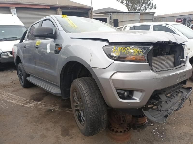 A Silver Ford Ranger is Sitting on the Ground in a Parking Lot — South West 4WD Wreckers In Harristown, QLD