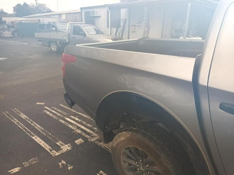 A Gray Truck is Parked in a Parking Lot — South West 4WD Wreckers In Brisbane, QLD
