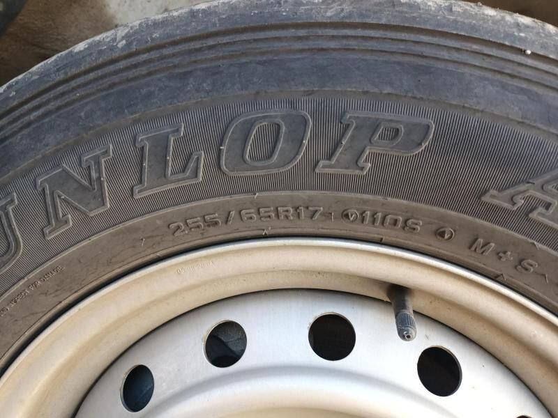 A Close Up of a Dunlop Tire on a Wheel — South West 4WD Wreckers In Harristown, QLD