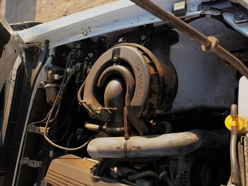 A Close Up of a Car Engine With the Hood Open — South West 4WD Wreckers In Harristown, QLD