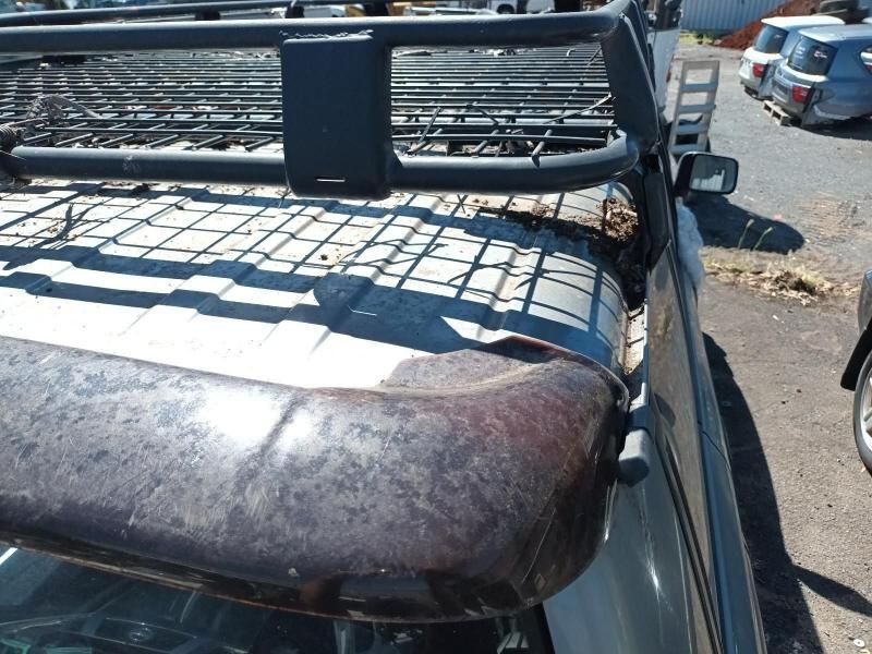 A Car With a Roof Rack on Top of It — South West 4WD Wreckers In Harristown, QLD