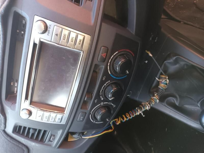 A Car Dashboard With a Phone Plugged Into It — South West 4WD Wreckers In Harristown, QLD
