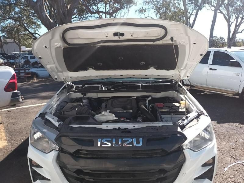 A White Isuzu Car With the Hood Up is Parked in a Parking Lot — South West 4WD Wreckers In Harristown, QLD